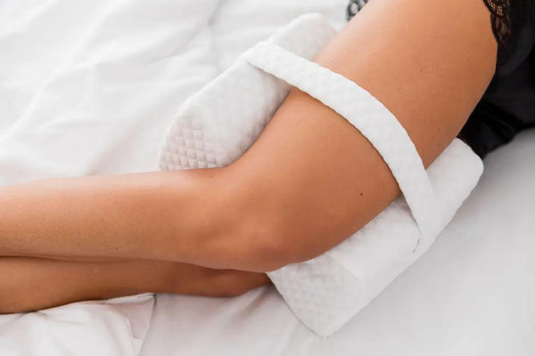 How Sleeping With a Pillow Between Legs Helps Back Pain